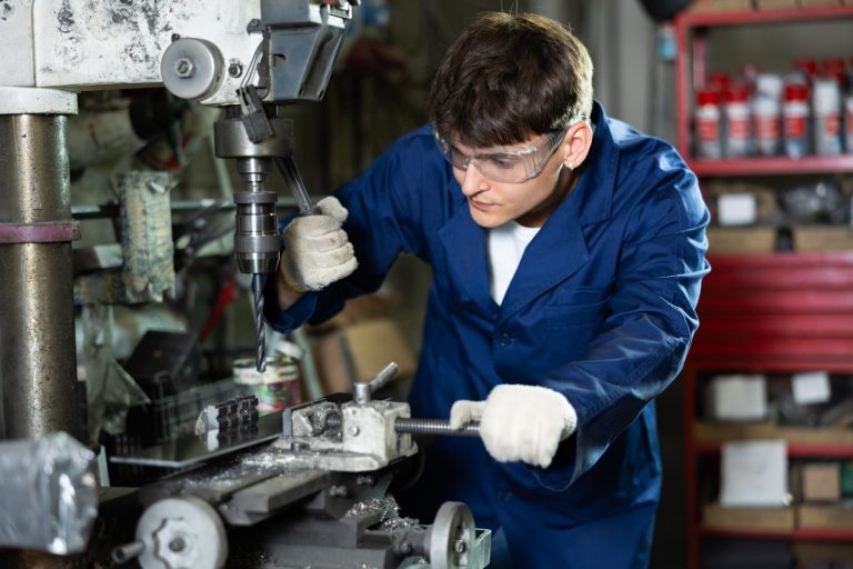 Engineer checking job listings on a phone during a break