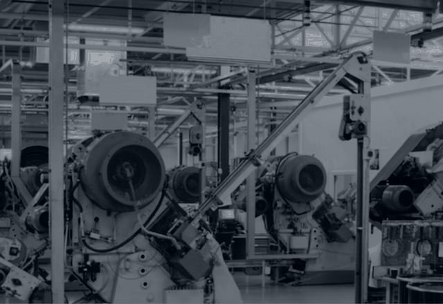 Automated machinery on a manufacturing production line