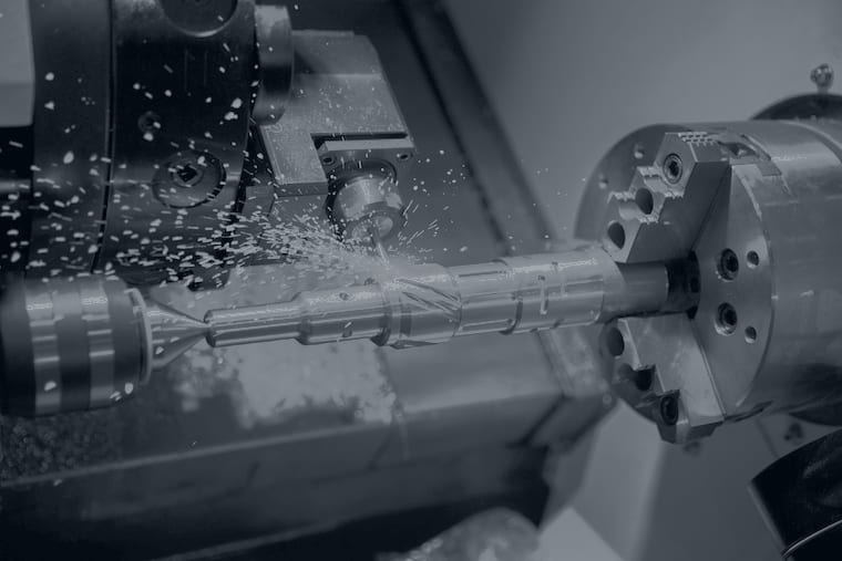 CNC lathe machining a metal part